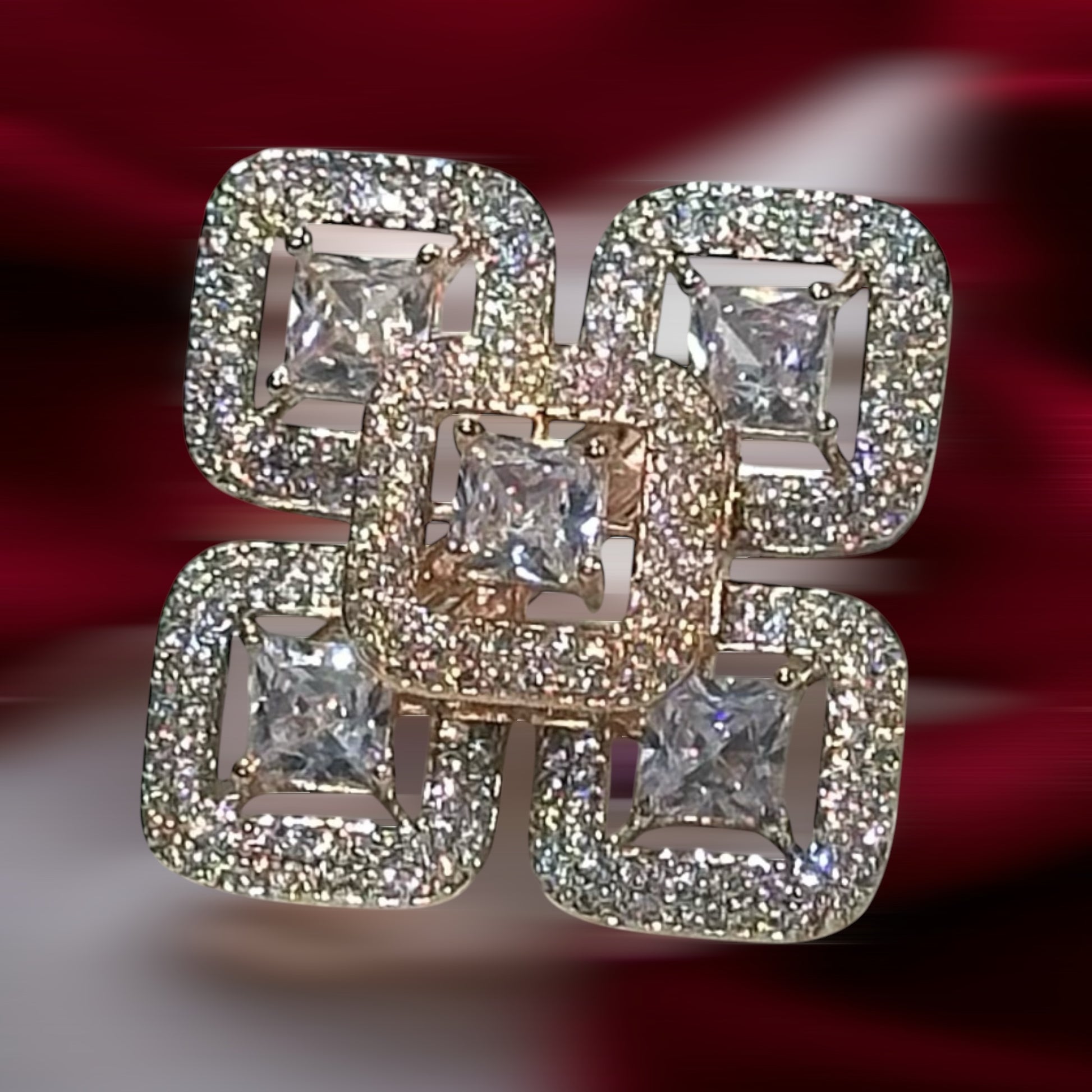 Face view of an American Diamond Finger Ring in 5 squares design with a diamond in each square on a red and white background 