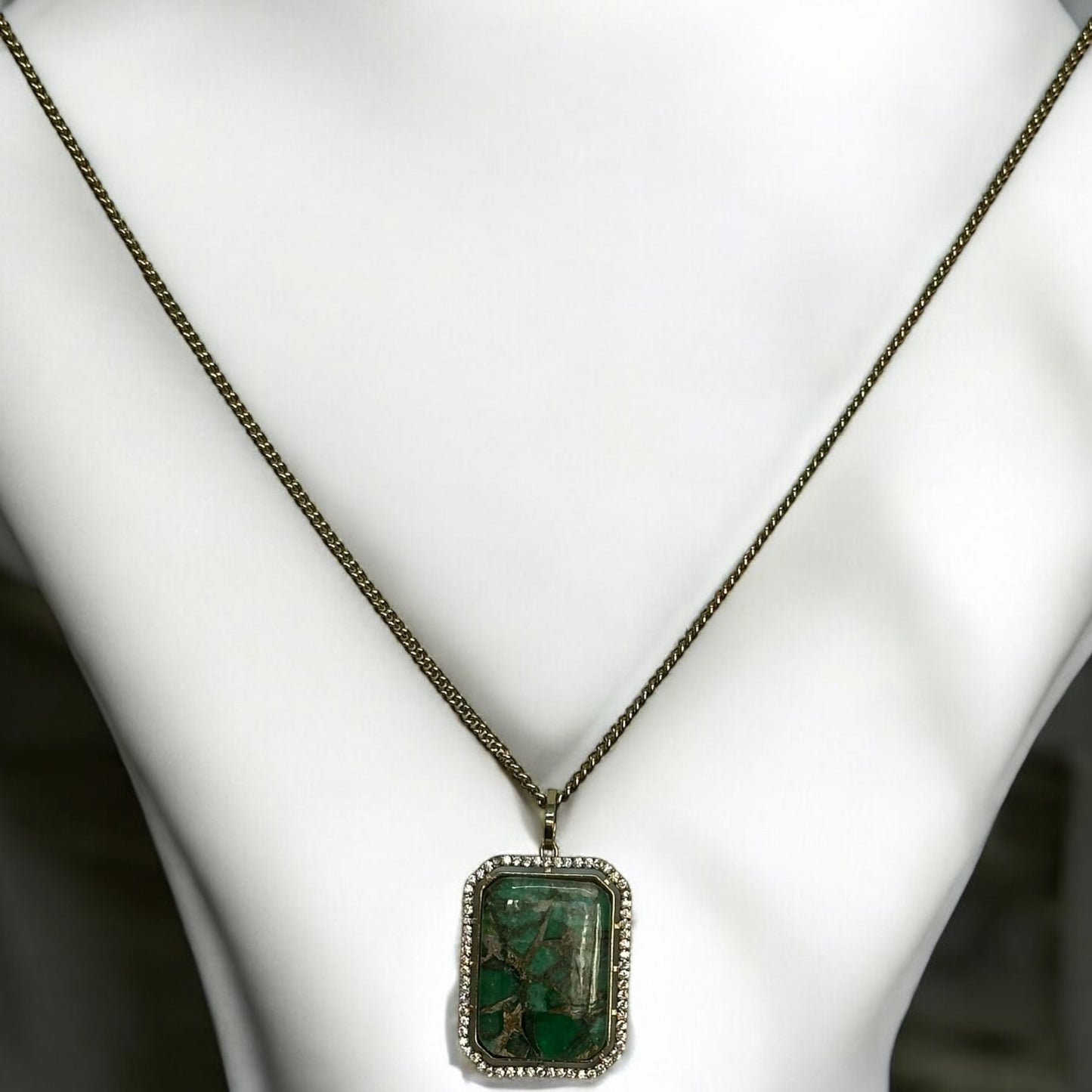 Beautiful Doublet Green Diamond Chain Pendant Set – gold-tone pendant set featuring a rectangular green doublet stone framed with shimmering diamonds. Perfect for formal and festive occasions.