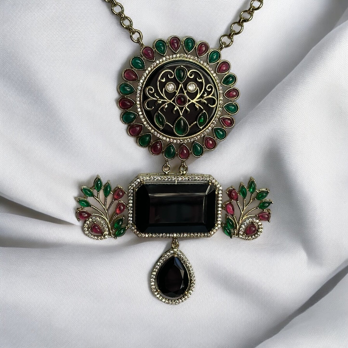 Amrapali-style long necklace with intricate black, red, and green accents in a fusion-inspired design.